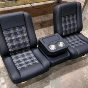 1986 Chevy C10 Buddy Bucket Seats – Classic Style, Modern Durability Restore your ’86 C10 interior with custom buddy bucket seats featuring heavy-duty black vinyl and plaid fabric inserts. Designed for a perfect factory-style bolt-in fit. UV-resistant vinyl & moisture-proof plaid inserts Reinforced steel frames & high-density foam for comfort Choose classic plaid or custom colors (extra cost) Direct fit for 1986 C10, may fit similar years Ideal for restoring vintage style or upgrading worn seats. Limited stock—order now!